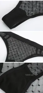 Detail of black mesh thong with polka dots and breathable cotton crotch for comfort