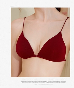 Close-up of wine red lace triangle bra featuring thin shoulder straps and fine textures