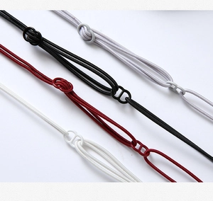 Detailed close-up of adjustable elastic lingerie straps in white, black, red, and grey tones