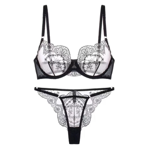 Elegant black lace lingerie set with floral embroidery and semi-sheer mesh bra