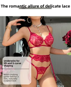 Detail view of red floral embroidery lace lingerie set with garter belt on model