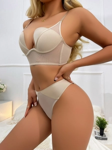 Detailed view of beige mesh lace lingerie set with wide band push-up bra and panties