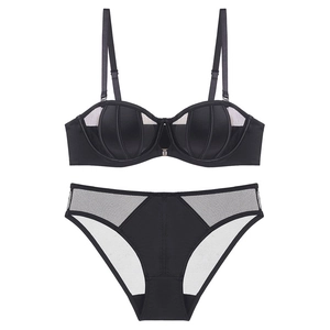 Detail of black seamless mesh lingerie set with rabbit ear design and satin finish