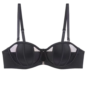 Detail of black satin and mesh shell-shaped bra with adjustable straps and front buckle