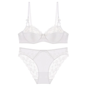 Elegant white lace lingerie set with wired bra and floral embroidery on white background