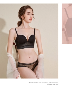 Close-up of French ultra-thin black lace lingerie with U-back design and polka dot detail