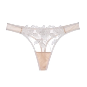 String sexy en dentelle pour femmes avec broderies florales blanches sur mesh beige
