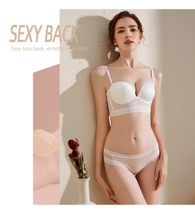 Detail of white seamless lingerie set featuring wide striped lace back and satin fabric