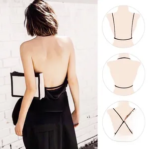 Detail of black backless lace bra showing three-way multiway strap styling options