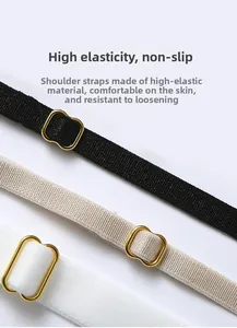 Close-up of adjustable elastic bra straps with gold metal buckles in black, beige and white