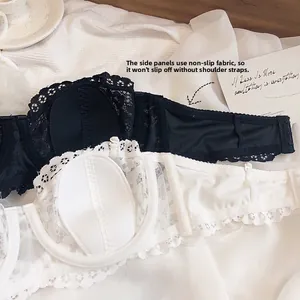 Detail of non-slip lace strapless bra with soft lining and triple row back hook closure