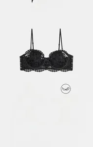 Detail view of black lace bra showing soft steel wire and thin breathable padding