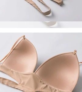 Detailed close-up of seamless beige bra showing soft inner padding and thin straps