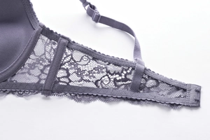 Detail of floral lace side wings and adjustable straps on this purple push-up bra set