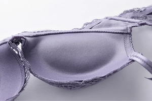 Macro shot of lavender lace bra showing fine stitching and breathable inner lining