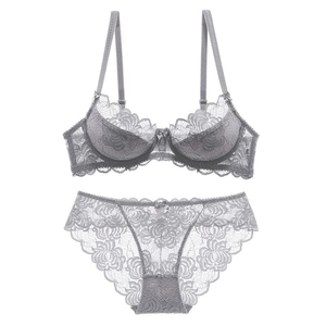 Elegant grey lace lingerie set with floral patterns and delicate bow details on white background