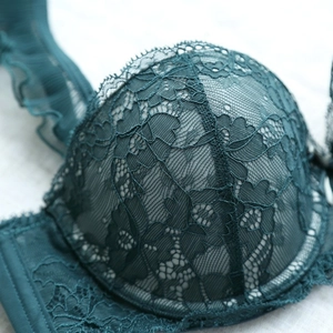 Lace push up bra in dark emerald green with floral pattern and eyelash trim details