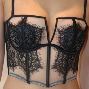 French lace corset top with floral embroidery and supportive fishbone structure in black