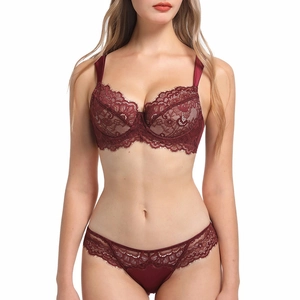 Deep red eyelash lace bra and panties set with floral embroidery on white background