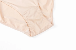 Close-up of seamless nude low-waisted panties with breathable smooth fabric and stitching