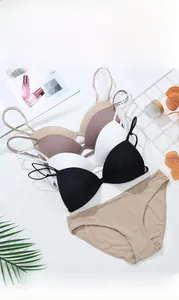 Detailed view of seamless triangle cup bras with front buckle design in multiple colors