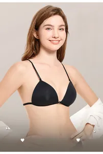 Detailed view of black front-closure wireless bra with thin straps and seamless fabric