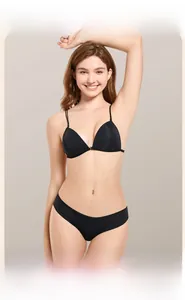 Close-up of seamless black wireless bra with front buckle and matching briefs