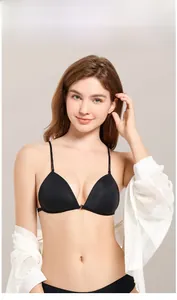 Front closure French triangle bra with thin straps and seamless black fabric on model