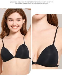 Detailed close-up showing the front clasp and seamless triangle cups of the black bra