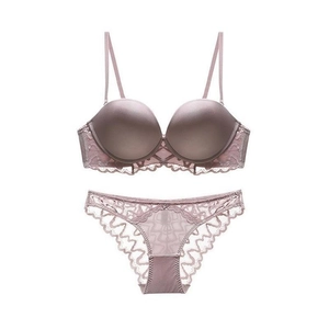 Elegant mauve seamless bra and lace panties set with soft underwire on white background