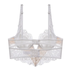 Detail view of white lace longline bra with double back-hook closure and fine lace texture