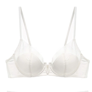 Detail of white deep V bra featuring elegant satin fabric and sheer mesh panels