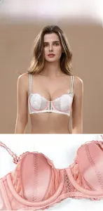 Close-up of breathable French lace bra featuring soft underwire and bunny ear cup pads