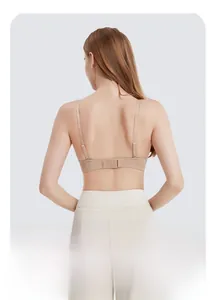 Back view of seamless skin-colored bra with low back design and thin shoulder straps