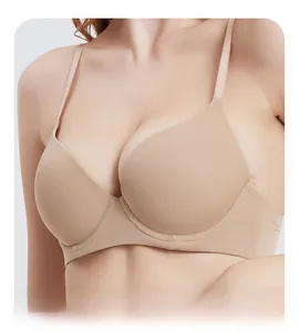 Close-up of nude seamless bra with thin straps and smooth fabric for a natural silhouette