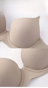 Detail of seamless nude bra showing smooth fabric texture and fine edge stitching