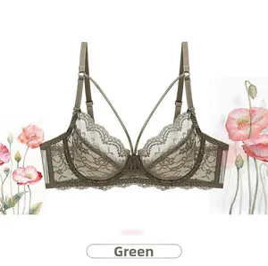 Close-up of dark green floral lace bra with intricate patterns and scalloped edges