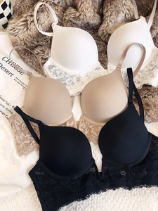 Lace bralette set in white, beige, and black featuring floral details and thin straps