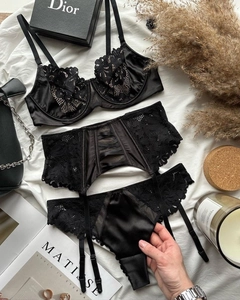 Three-piece black lace lingerie set with silk satin details and delicate floral embroidery