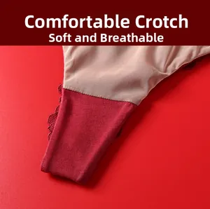 Detail of red lace panties showing breathable beige mesh lining and cotton fabric texture