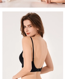 Detail view of black seamless low back bra with adjustable straps for open-back outfits