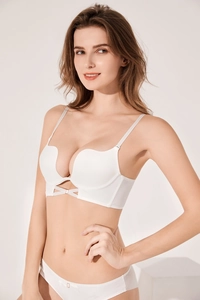 Detailed macro view of white push-up bra set with U-neck design and metal buckle detail