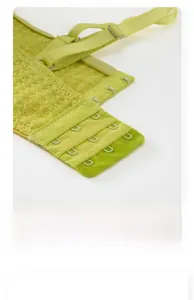 Macro shot of lime green waffle textured bra featuring a four-row hook and eye closure