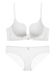 Detail of white seamless push-up lingerie set with silky texture and sheer mesh wings