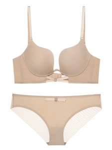 Detail of nude seamless push-up bra set featuring mesh side wings and metal buckle