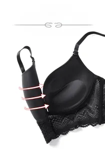 Detail view of black wireless bra featuring integrated molded cups and lace hem decoration