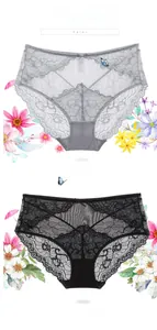 Close-up of elegant floral lace underwear in gray and black with small bow details