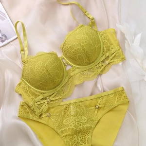 French lace lingerie set with underwire bra and matching panties in vibrant lime green