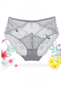 Close-up of gray lace underwear with floral patterns and a small decorative bow