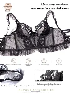 Detail of black lace bra with polka dot mesh, floral embroidery and ruffled straps